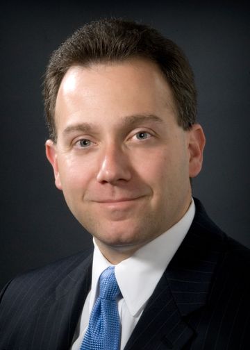 Michael Fener wearing a blue tie